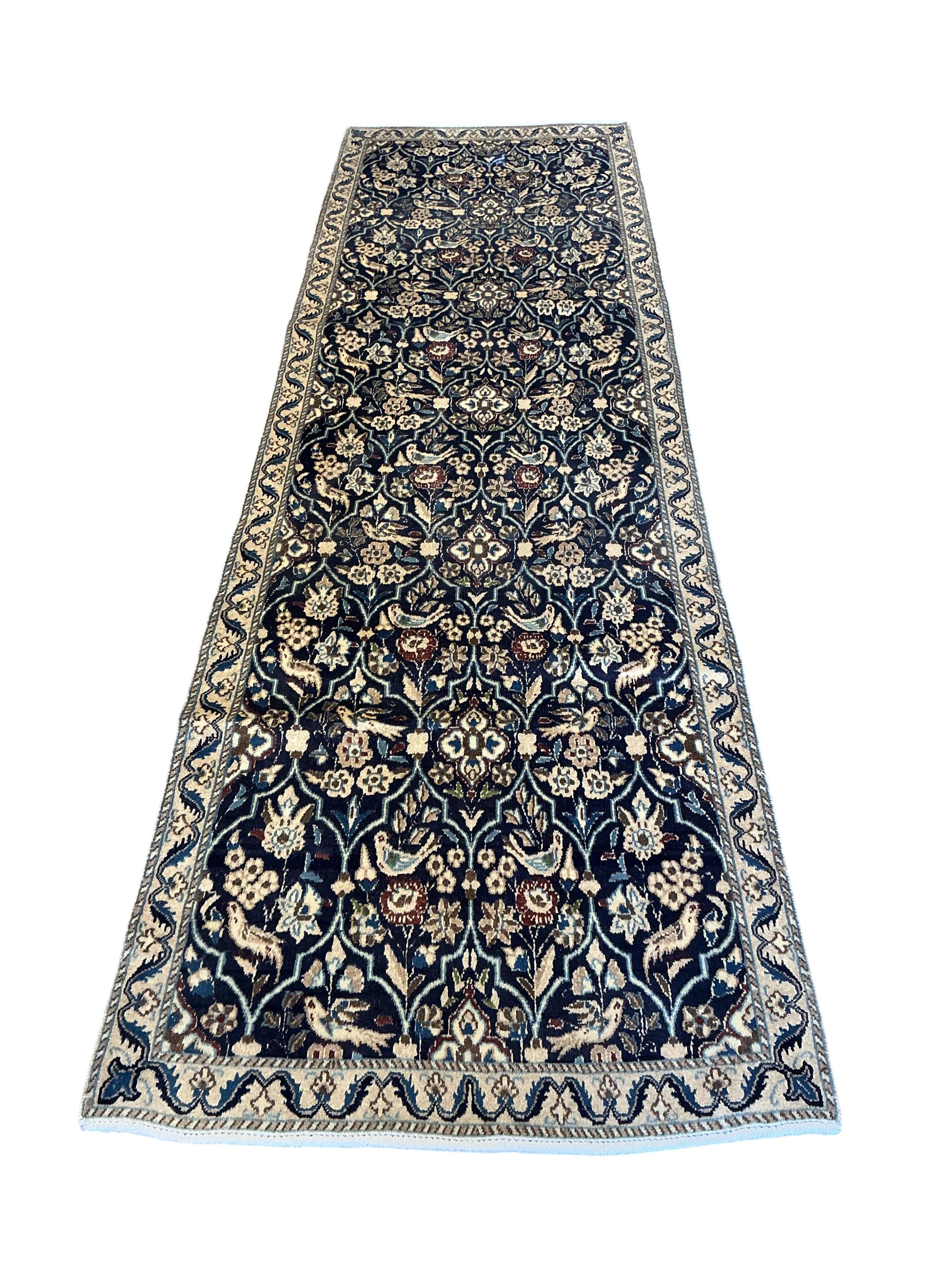 A Nain blue ground runner, 280 x 85cm